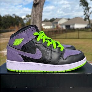 Jordan Black and Purple Athletic Shoes with Green Accents